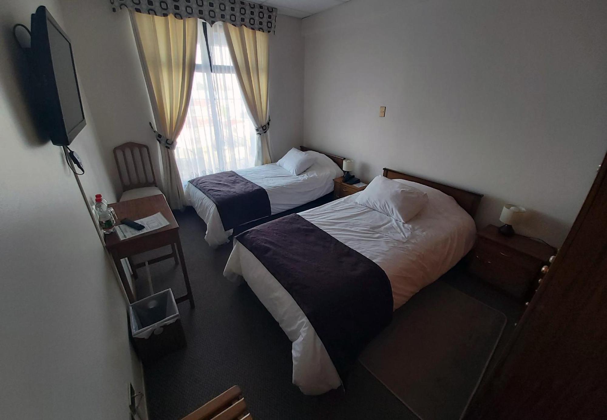 Hotel Esmeralda Castro Værelse billede